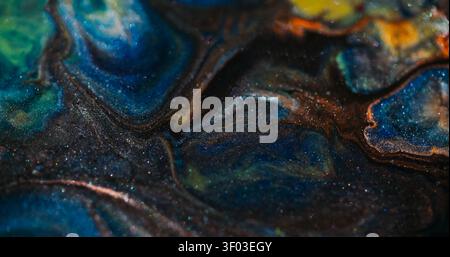 Dark shimmering splash defocused shiny texture ink Stock Photo