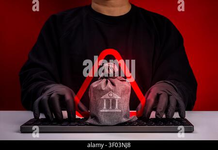 Banking cyber attack and financial fraud concept showing cybercriminal targeting financial institution systems. Cybersecurity threat, banking risk, da Stock Photo