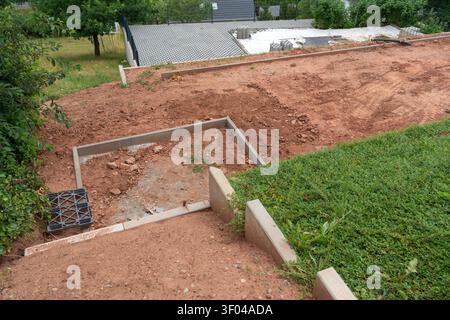 Aerial view of a residential construction site with tower cranes and ...