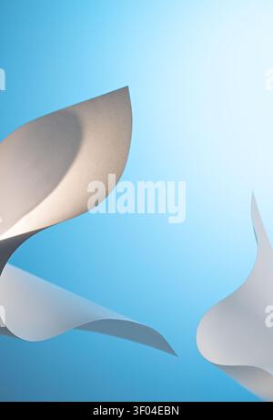 White paper curves on blue background with soft shadows for abstract minimal mockup Stock Photo