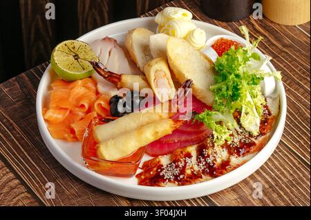 Gourmet assorted seafood appetizer platter with fish Stock Photo
