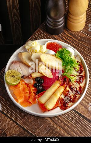 Gourmet assorted seafood appetizer platter on a table Stock Photo