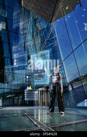 Futuristic woman using a holographic augmented reality interface Stock Photo