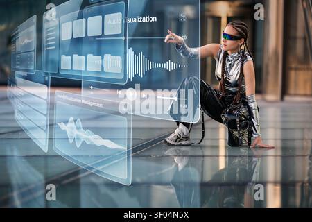 Futuristic woman using a holographic audio interface Stock Photo