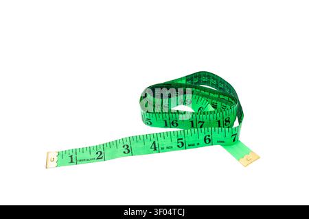 Folded Green Measuring Tape Isolated on White Background with Copy Space. Stock Photo