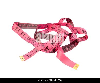 Tangled Pink Measuring Tape Isolated on White Background Stock Photo