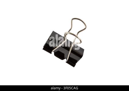 Black metal binder clip with silver wire handles, isolated on white background. Office stationery accessory for organizing documents, paperwork and wo Stock Photo