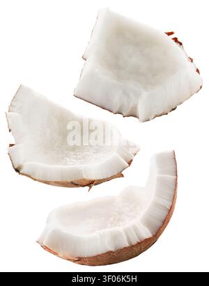 Three pieces of fresh sliced organic coconut fruit isolated on white. Stock Photo