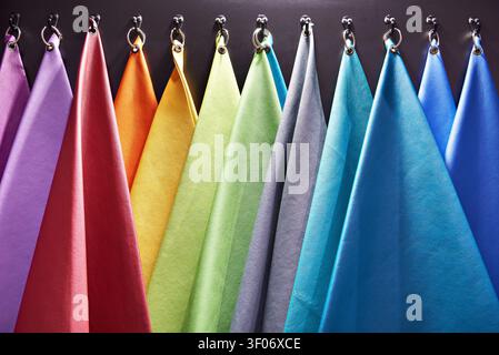 Samples of colored genuine leather in the store at the exhibition Stock Photo