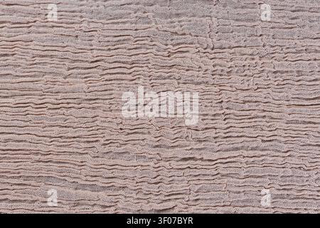 Beige Crinkled Gauze Fabric Texture Close Up Stock Photo