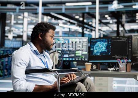 Person with paraplegia in inclusive server facility applying AI neural network models. Stock Photo