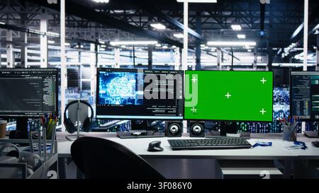 IT specialist reviews neural network visualization on green screen computers in a server room during software debugging work. Stock Photo