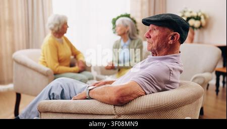 Thinking, elderly man and memory on couch, contemplating and old friends with gossip in living room. Serious, reflection and senior people in lounge Stock Photo