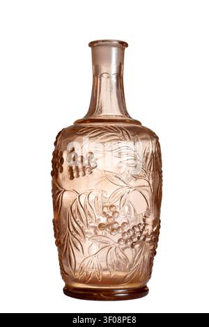 Glass bottle with grape ornament on a white background. An empty wine decanter. Stock Photo