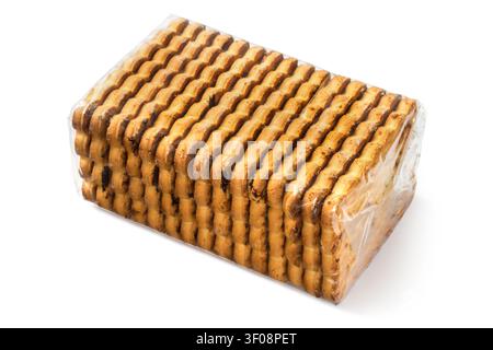 Transparent packaging of rectangular biscuits on a white background. Close-up of a pack of cookies. Stock Photo