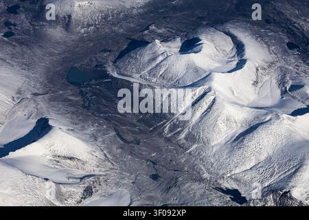 Snow-covered volcanic landscape viewed from above Stock Photo