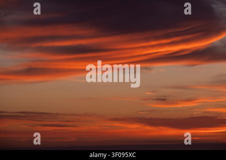 Spectacular Sunset clouds over the ocean seen from the north coast of Cornwall at Crantock, England. Stock Photo