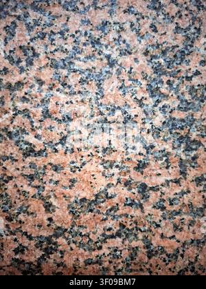 This captivating display showcases the intricate texture of gray pink marble, highlighting its unique patterns and colors. Perfect for interior design Stock Photo