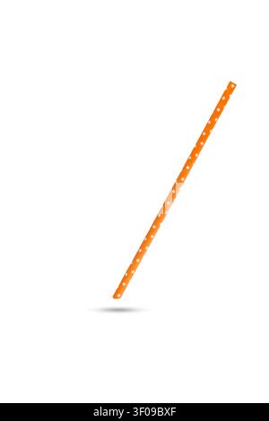 A orange with white polka dots straw floating on a white background Stock Photo