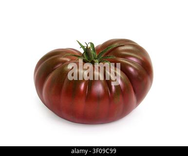 Heirloom tomato red brown vegetable on white background Stock Photo