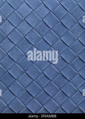 Woven blue suede leather texture background with diagonal interlaced pattern close-up Stock Photo