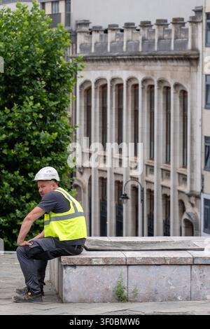 Resting construction worker Stock Photo