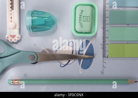 Modern pastel stationery accessories arranged for school, office work, education and stationery store promotion. Stock Photo