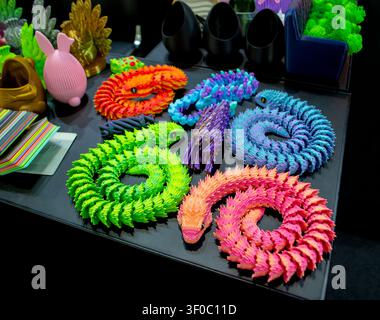 Objects toy multicolored color printed on 3D printer. Model printed on 3D printer from molten plastic. FDM technology. Fused Deposition Modeling. Additive modern manufacturing technology. 3D printing Stock Photo
