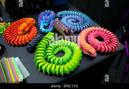 Objects toy multicolored color printed on 3D printer. Model printed on 3D printer from molten plastic. FDM technology. Fused Deposition Modeling. Additive modern manufacturing technology. 3D printing Stock Photo