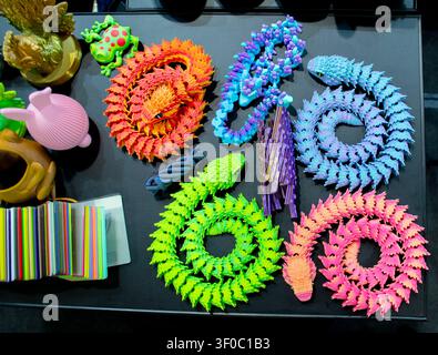 Objects toy multicolored color printed on 3D printer. Model printed on 3D printer from molten plastic. FDM technology. Fused Deposition Modeling. Additive modern manufacturing technology. 3D printing Stock Photo