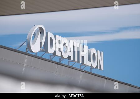 Grancia, Ticino, Switzerland - 10th June 2026: Selective focus on Decathlon store sign showing the new corporate logo branding. Stock Photo