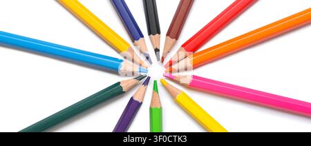 Colorful pencils arranged in a circle on white background Stock Photo