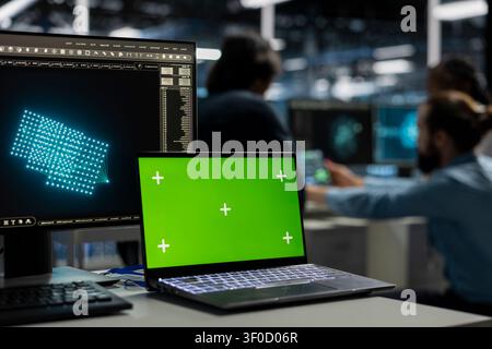 Developer uses an AI language model assistant in a server hub to handle infrastructure maintenance. Stock Photo
