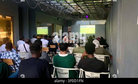 Football fans eagerly await the Egyptian-Argentine dream match. Khartoum, Sudan July 7: One of the public viewing areas at a restaurant that has been broadcasting tournament matches in the Sudanese capital, Khartoum-Omdurman, hosted today the Argentina vs. Egypt match in the Round of 16 of the 2026 FIFA World Cup. A large number of fans gathered to support both teams amid an enthusiastic atmosphere, reflecting the great interest in the tournament and the publics participation in group viewing events. photo by Abdul-Razzaq Saif al-Din / JNA Press. Omdurman Sudan Copyright: x xAbdulxRazzaqxSaifx Stock Photo