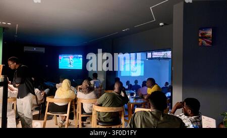 Football fans eagerly await the Egyptian-Argentine dream match. Khartoum, Sudan July 7: One of the public viewing areas at a restaurant that has been broadcasting tournament matches in the Sudanese capital, Khartoum-Omdurman, hosted today the Argentina vs. Egypt match in the Round of 16 of the 2026 FIFA World Cup. A large number of fans gathered to support both teams amid an enthusiastic atmosphere, reflecting the great interest in the tournament and the publics participation in group viewing events. photo by Abdul-Razzaq Saif al-Din / JNA Press. Omdurman Sudan Copyright: x xAbdulxRazzaqxSaifx Stock Photo