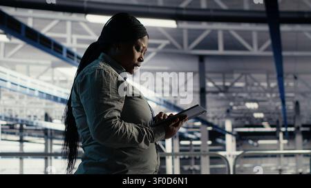 Server facility software developers roll out machine learning software on infrastructure racks. Stock Photo