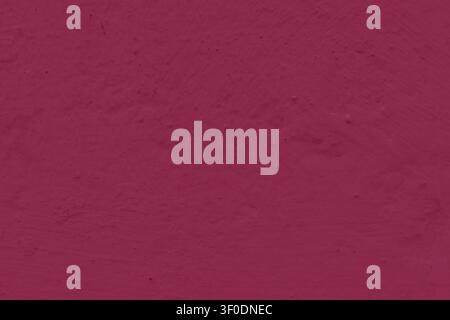 Texture of a freshly painted concrete wall. Red, dark pink concrete wall. Stock Photo