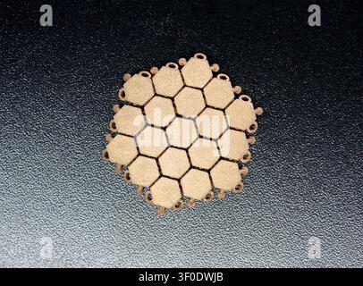 Object modular field with hexagonal structure printed on 3D printer. Model printed on 3D printer from metal powder. Selective Laser Melting. SLM. Additive modern manufacturing. 3D printing technology Stock Photo