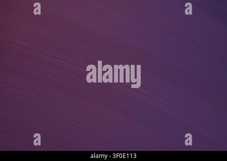 Dynamic ICM abstract featuring fluid diagonal lines in shades of plum, magenta, and indigo. The soft grain and motion blur create a sleek, sophisticat Stock Photo