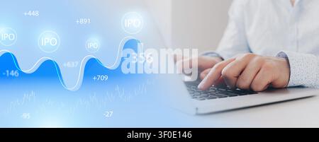 Market activity during the initial public offering IPO process with data displayed on a laptop screen Stock Photo