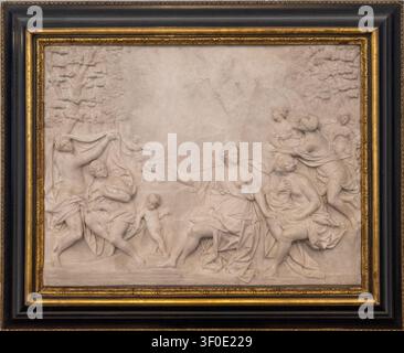Berlin, Germany - 23 May 25: Framed marble relief with allegorical figures displayed in the Bode Museum in Berlin, Germany, photographed straight on. Stock Photo