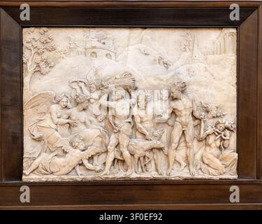 Berlin, Germany - 23 May 25: Marble relief with mythological figures in a wooden frame displayed at the Bode Museum in Berlin, Germany. Stock Photo