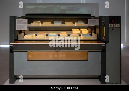 Berlin, Germany - 23 May 25: Large archival card filing machine displayed at the Berlin Stasi Museum in Berlin, Germany. Stock Photo
