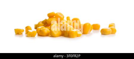Sweet yellow corn kernels arranged in a small pile on a clean white background, showing glossy texture and vibrant color. Ideal for food, cooking, ing Stock Photo