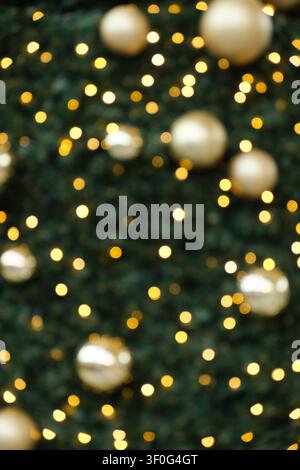 Elegant New Year's Eve Celebration Backdrop with Glittering Golden Balls and Warm Glow. Stock Photo