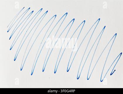 Wavy blue lines are drawn across a plain background. The design represents an abstract concept created with a marker pen. This piece shows a simple an Stock Photo