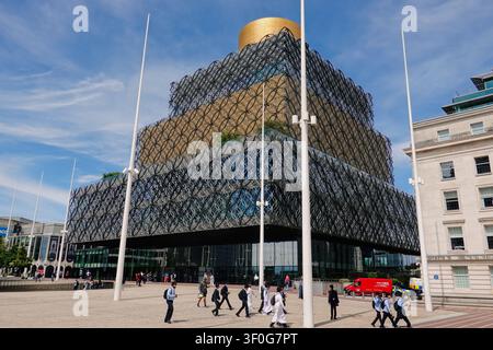 Pedestrians passing the Library of Birmingham in Centenary Square, UK Stock Photo