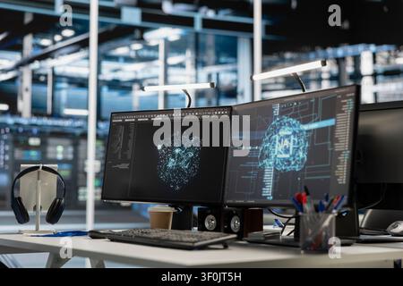AI research workstation displays neural network visuals and code analysis tools. Stock Photo
