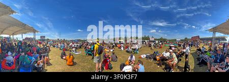 Crowds relax in the Silverstone Fanzone during the Formula 1 British Grand Prix, Silverstone Circuit, Northamptonshire, England, UK Stock Photo