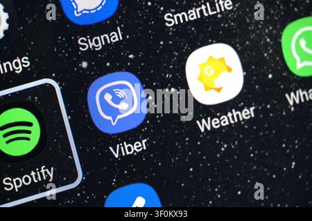 PLANO, TX, USA - JULY 06, 2026: A smartphone screen displays various app icons including Spotify, Signal, and Viber against a starry background. These Stock Photo